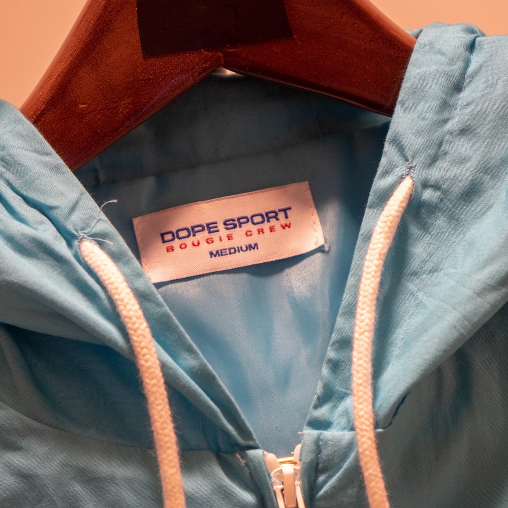 Medium sized DOPE zip-up wind breaker with hoodie